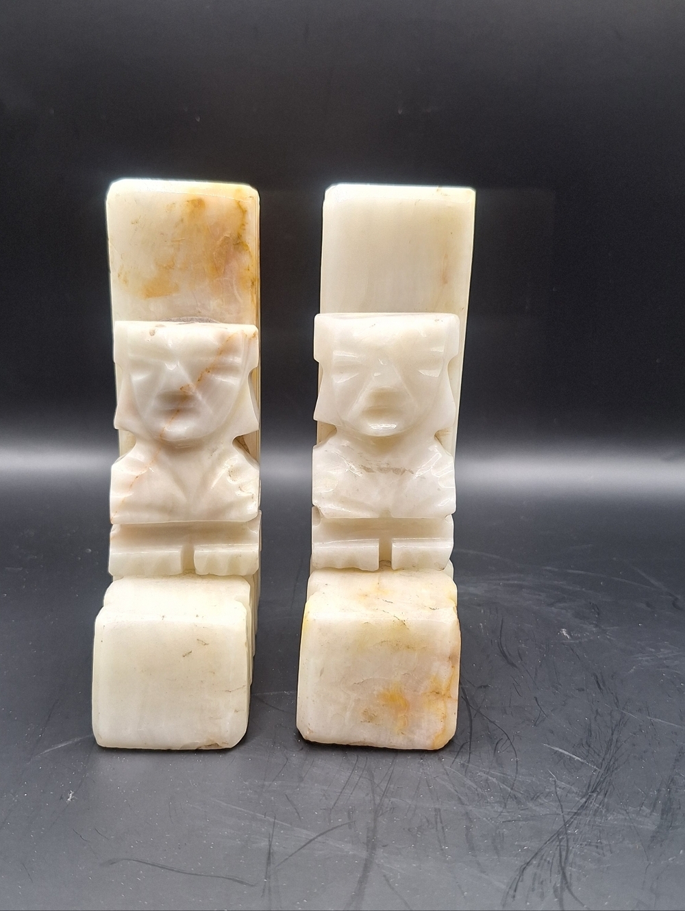 These are vintage hand-carved alabaster or onyx stone bookends
